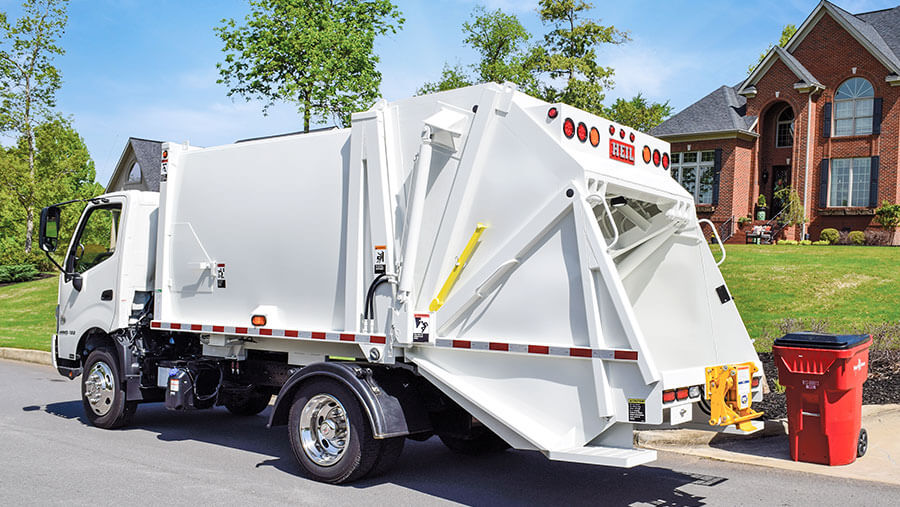 HEIL INTRODUCES SMALL MINI REAR LOAD GARBAGE TRUCK BODIES - Heil